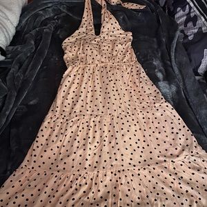 Beautiful pink and black polka dot dress. Great for spring and summer.